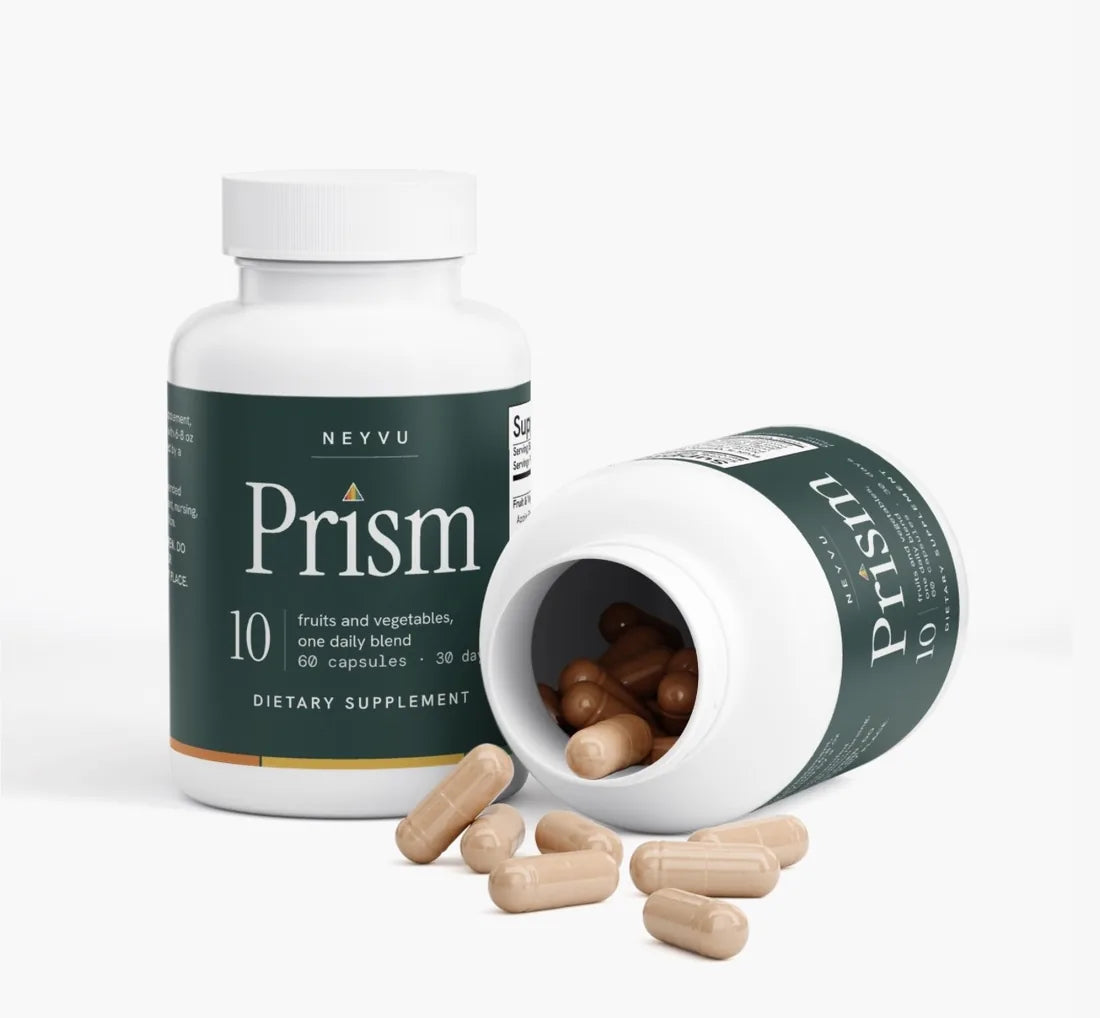 Neyvu Prism bottle lying open with capsules spilling out, next to a second bottle standing upright
